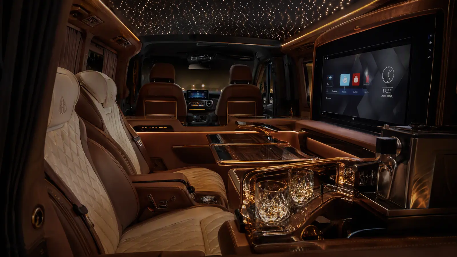 Interactive interior of a Barugzai VIP luxury van with captain seats, starlight ceiling and smart TV